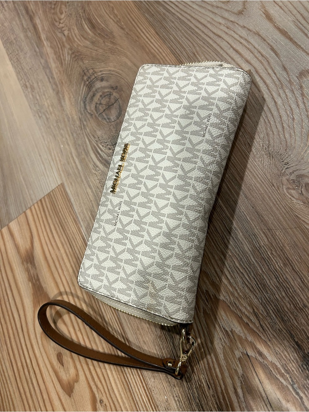 Michael Kors Cream Logo Zip Wristlet with Brown Strap